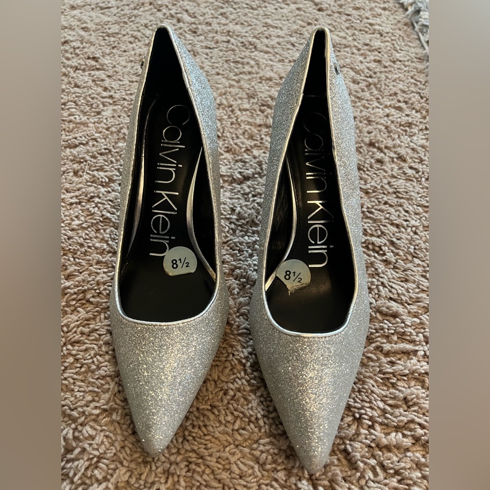 Calvin Klein, stiletto heels, color is silver with glitter, size 8.5